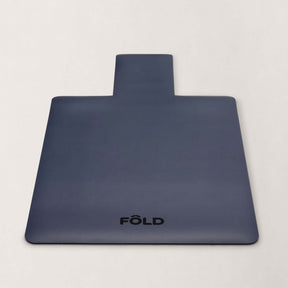 FOLD Reformer Pilates Mat - Navy, featuring durable and soft cushioning for comfortable workouts.