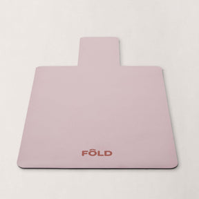 FOLD Reformer Pilates Mat - Pink, designed for comfort and stability during workouts, featuring a soft surface.