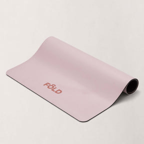 FOLD Reformer Pilates Mat - Pink, showcasing a durable and cushioned design ideal for Pilates workouts.