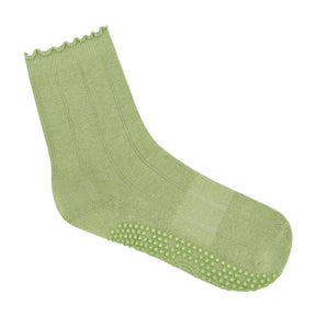Frilly green Pilates grip socks side view