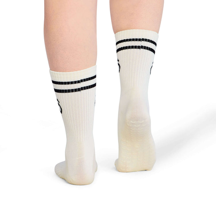Crew Sporty Stripes Pilates Grip Socks - White displayed on feet with non-slip design.