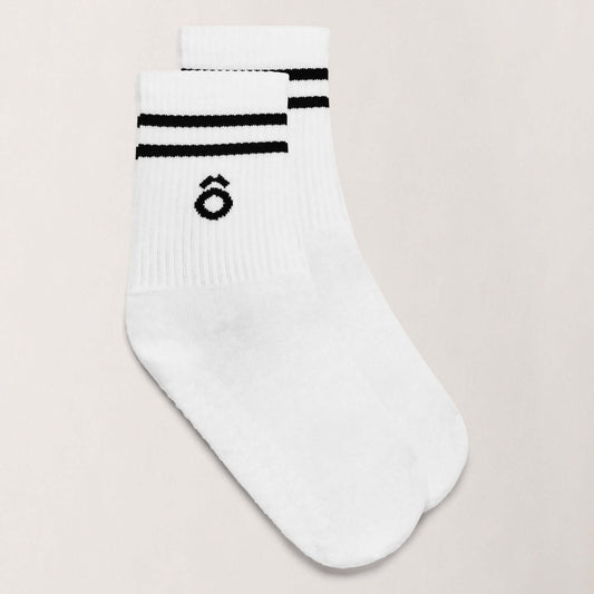 September Accessories Bundle - White sporty stripes Pilates grip socks with logo on a neutral background.